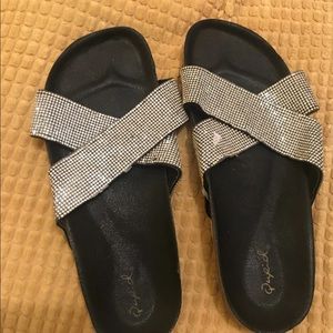 black and silver jesus sandals